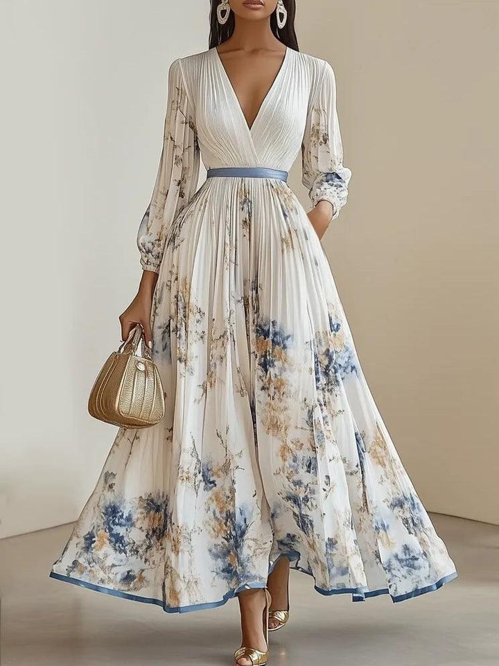 Maya | Maxi dress made of chiffon with a floral pattern in white with voluminous sleeves